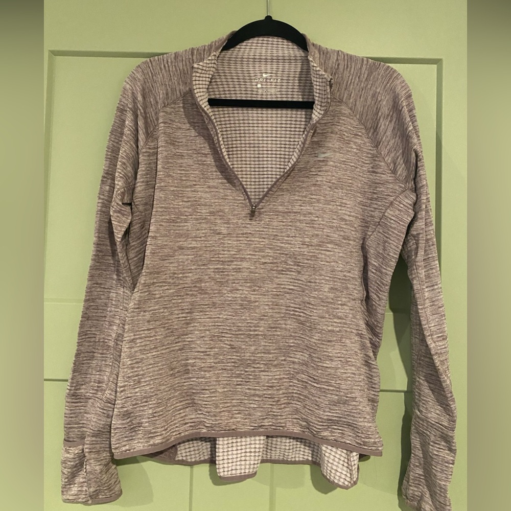 Nike dri-fit three quarter zip pull over.